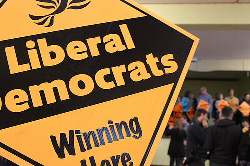 A poster with the bird of liberty, 'Liberal Democrats' and 'Winning Here'